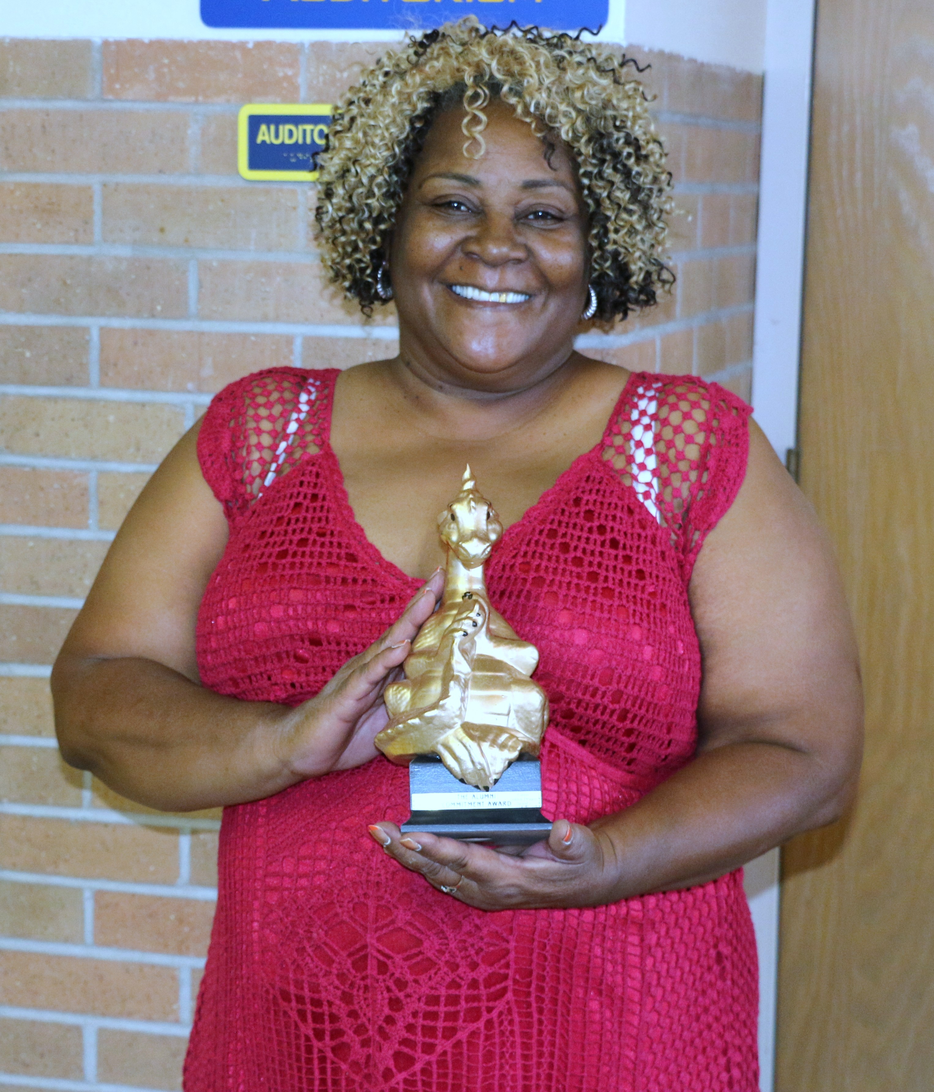 Mrs. Lila Ford Mitchell accepted the award for Mr. Thurman Jefferson